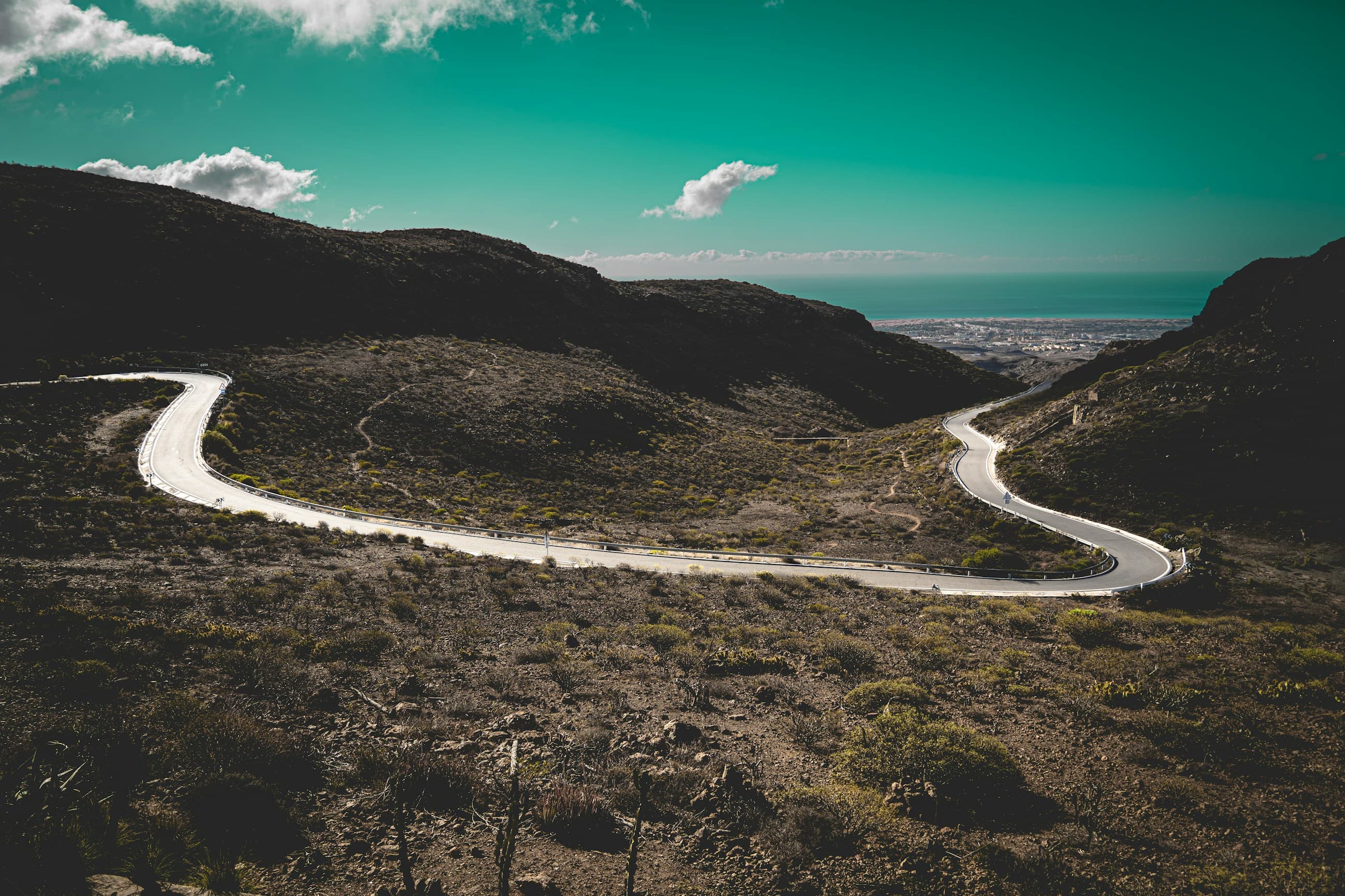 The road winding down toward the south coast and the sea
