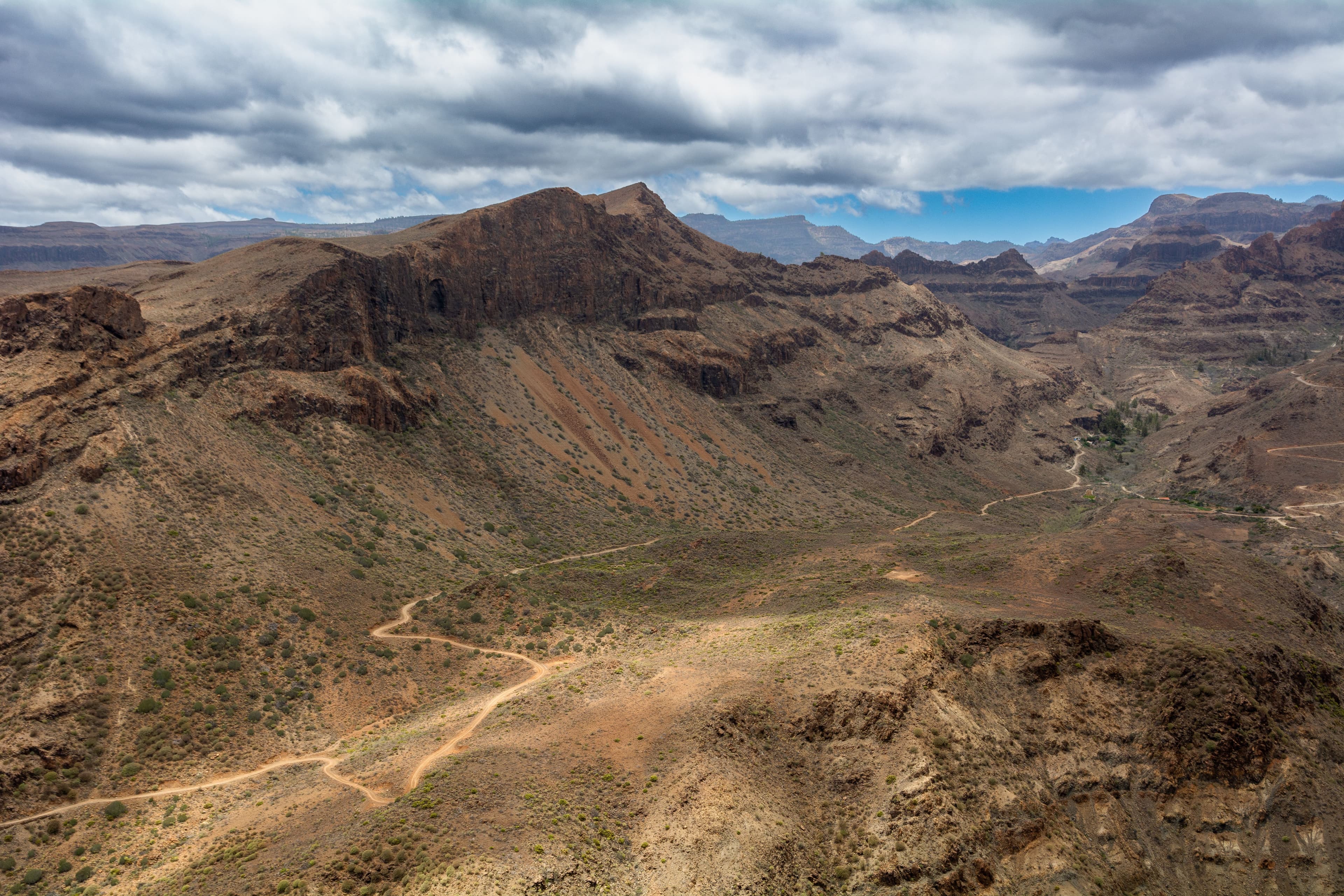 A wide dry valley in Gran Canaria's interior seen from above